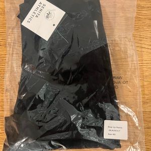XS Senita brand step up pants in blackout. Never worn, NWT in bag.